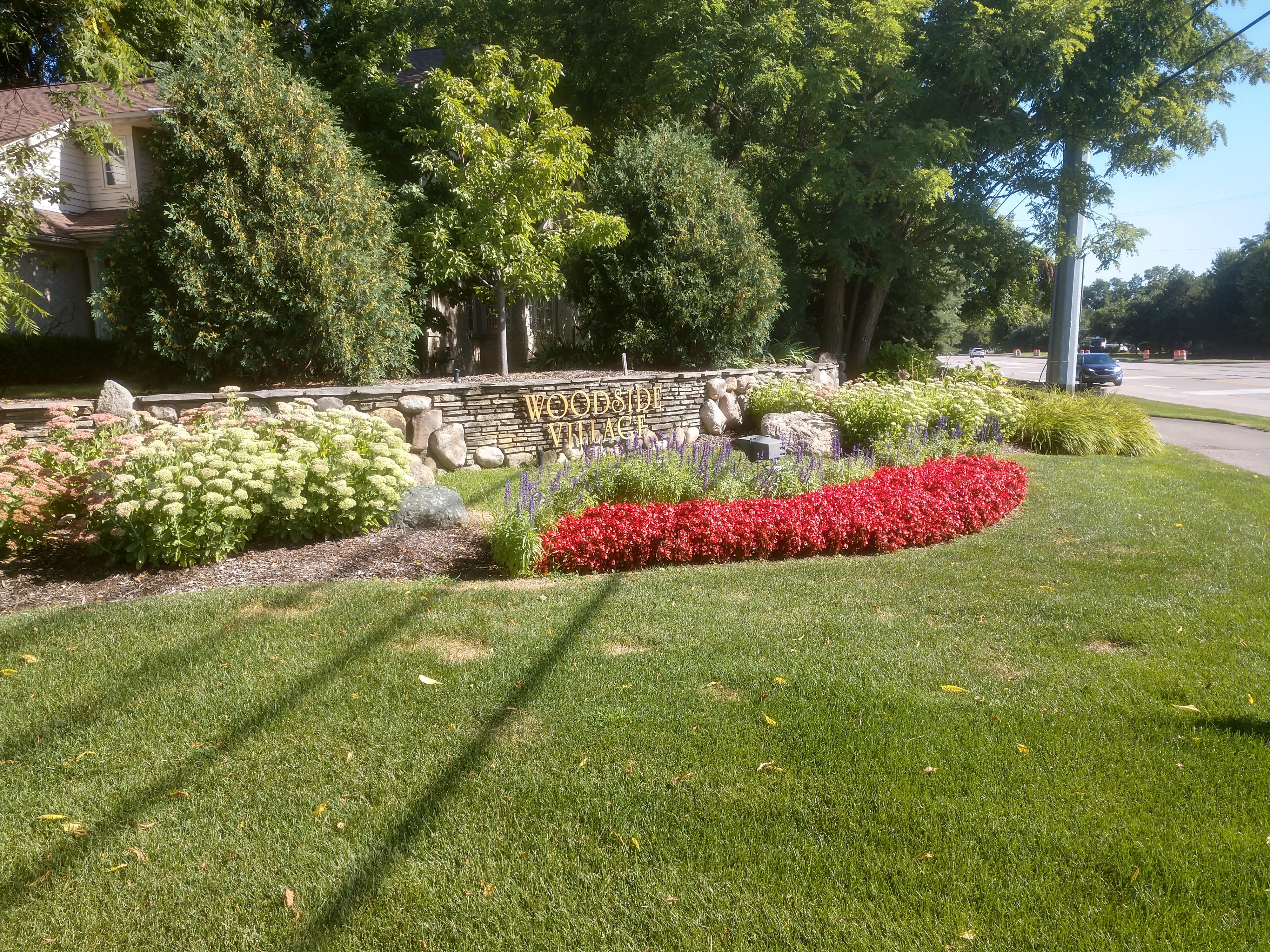 Woodside Village side with annual flowers